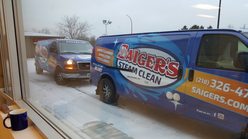 2 vans out window.jpg